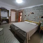 Апартаменты Su Skusorgiu